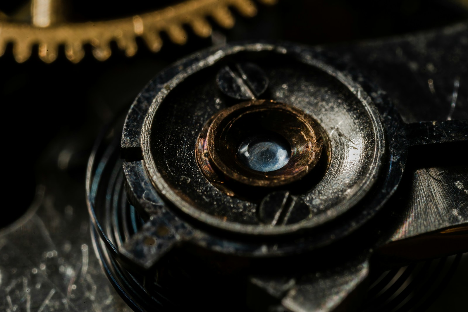 black and gold round metal